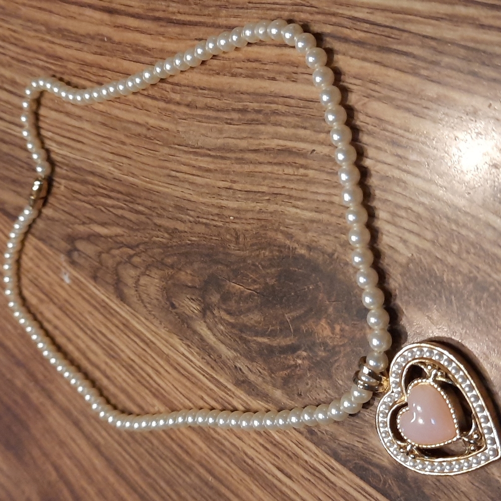 Costume jewelry pearl necklace with pink heart